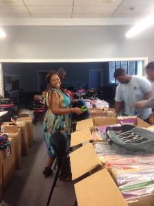 Woman Posing in Front of Boxes